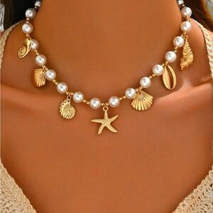 Elegant Pearl and Gold Seashell Necklace